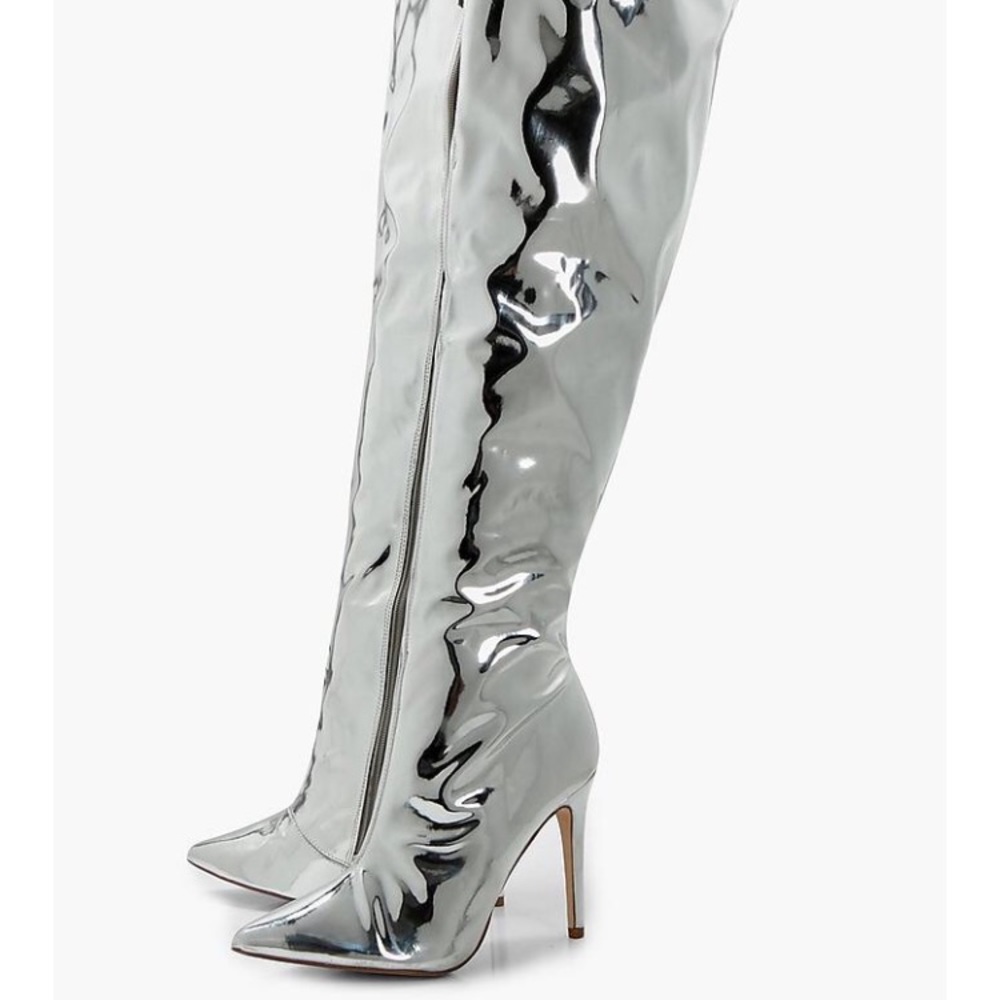 Metallic silver thigh high boots